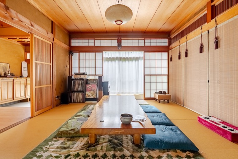 Floor cushions set around the table